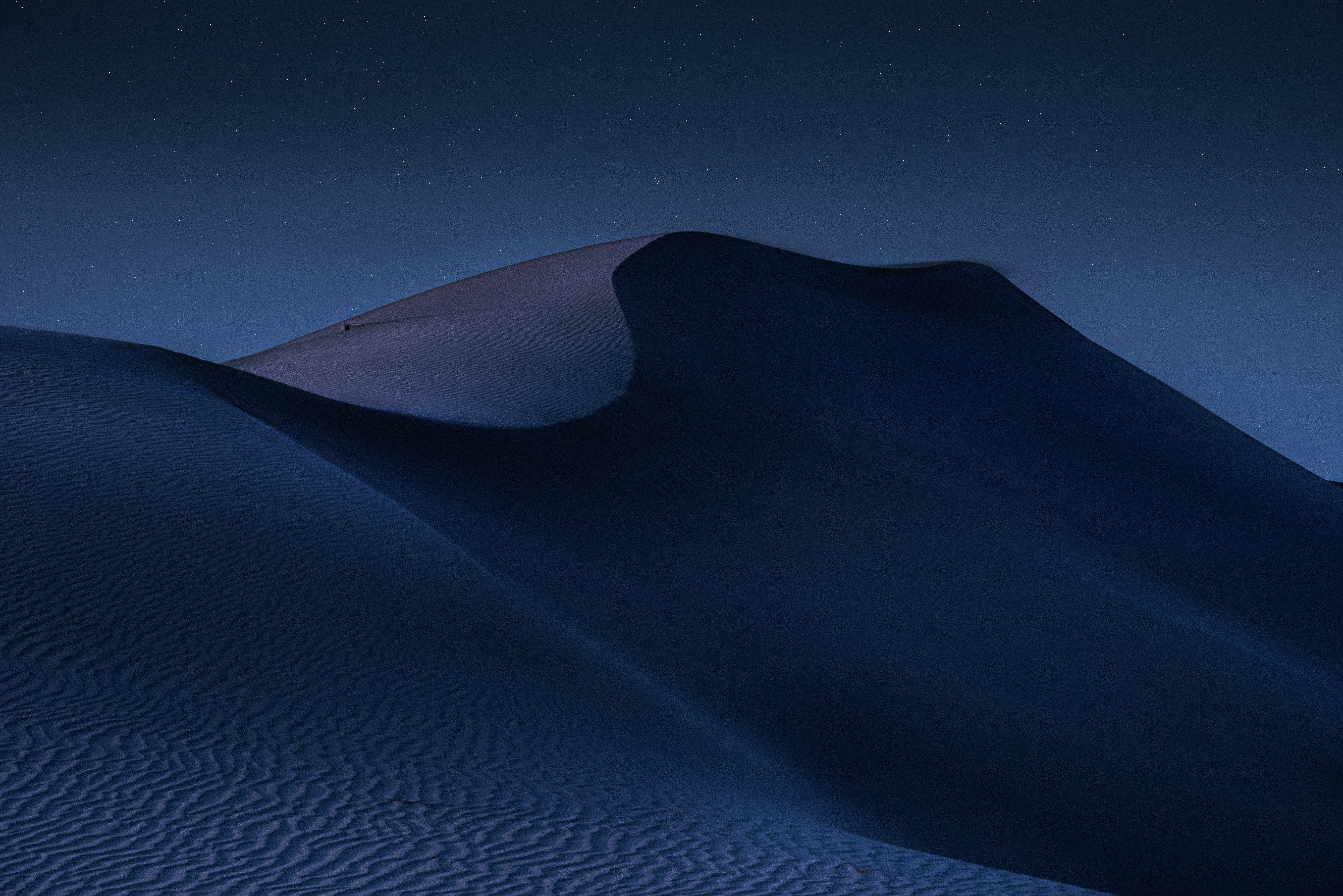 Sand Dune by Mike Yukhteno or Daniel Olah on unsplash